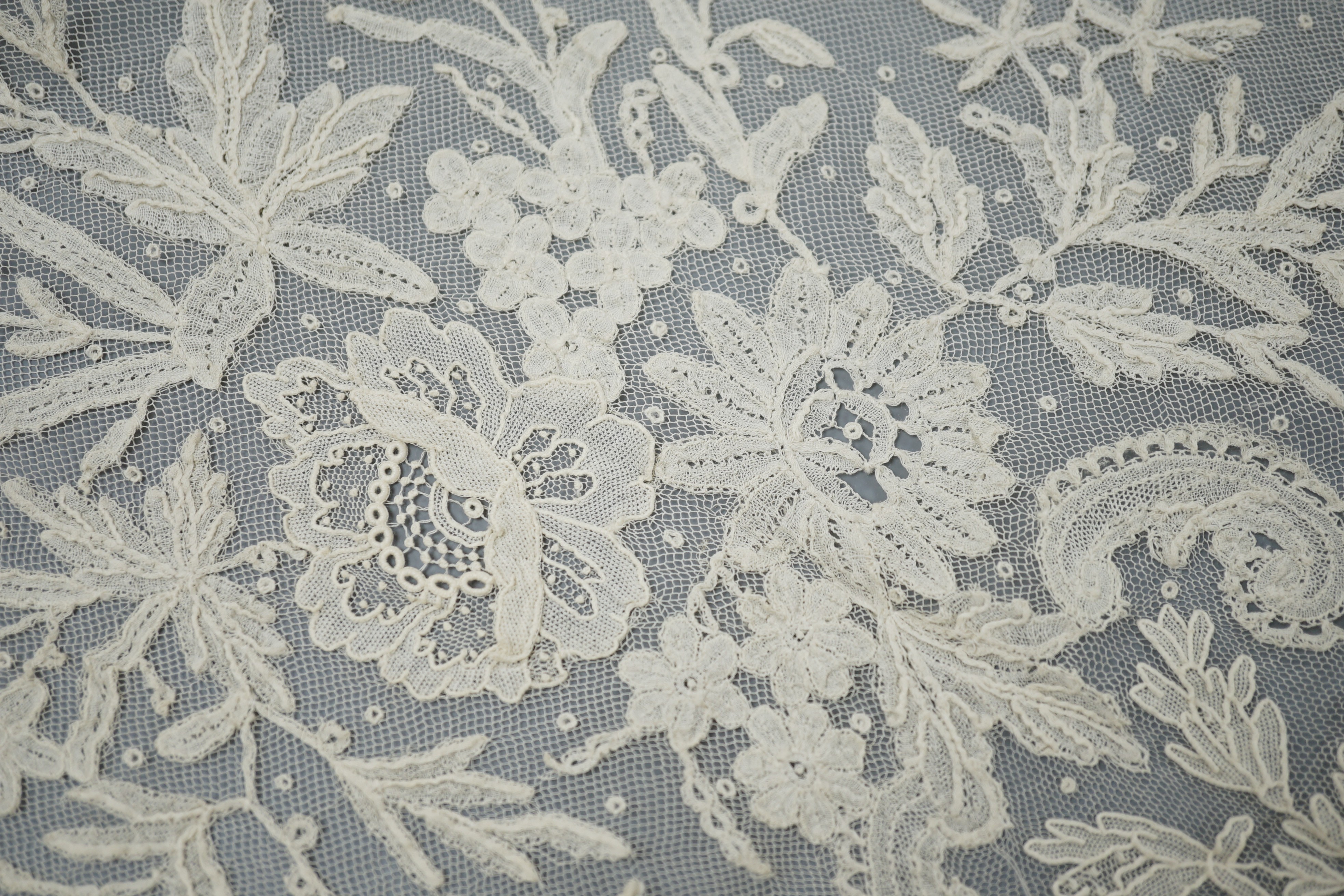 A mixed Brussels lace berth with fine needle lace floral insertions, together with a mixed bobbin veil and needleworked Brussels stols